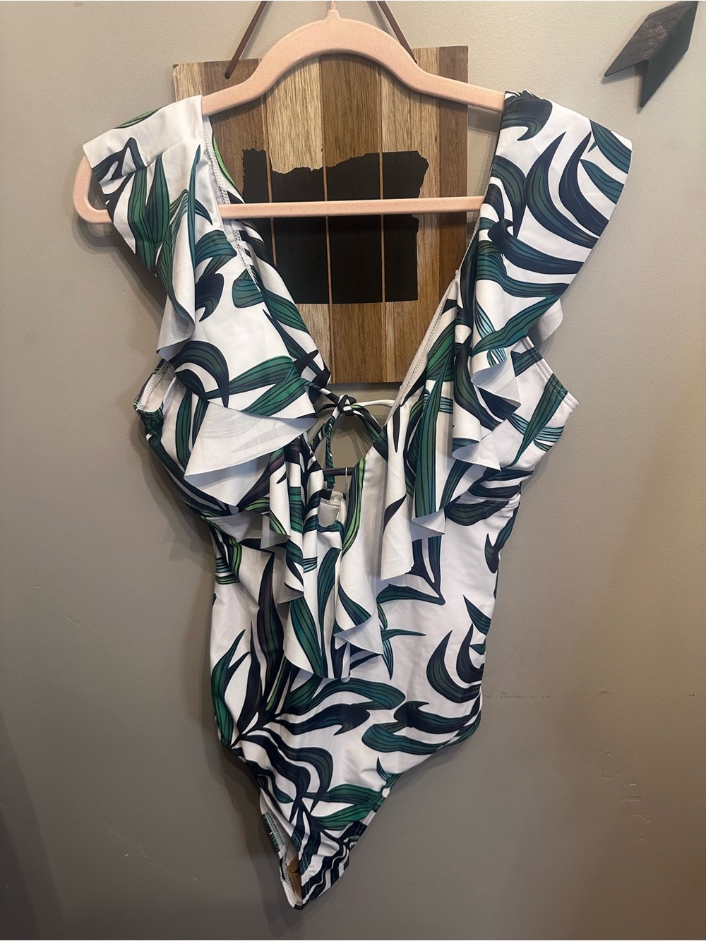 Ruffled V-Neck One-Piece Swimsuit in White with Green Leaf Print